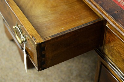Lot 8 - An early 20th Century stained pine writing desk.