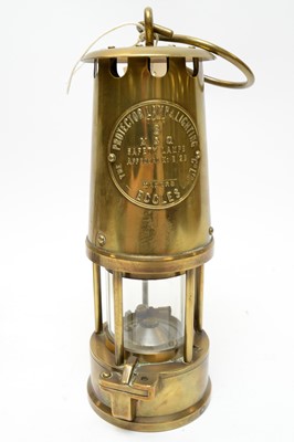 Lot 517 - Eccles brass miners lamp and another