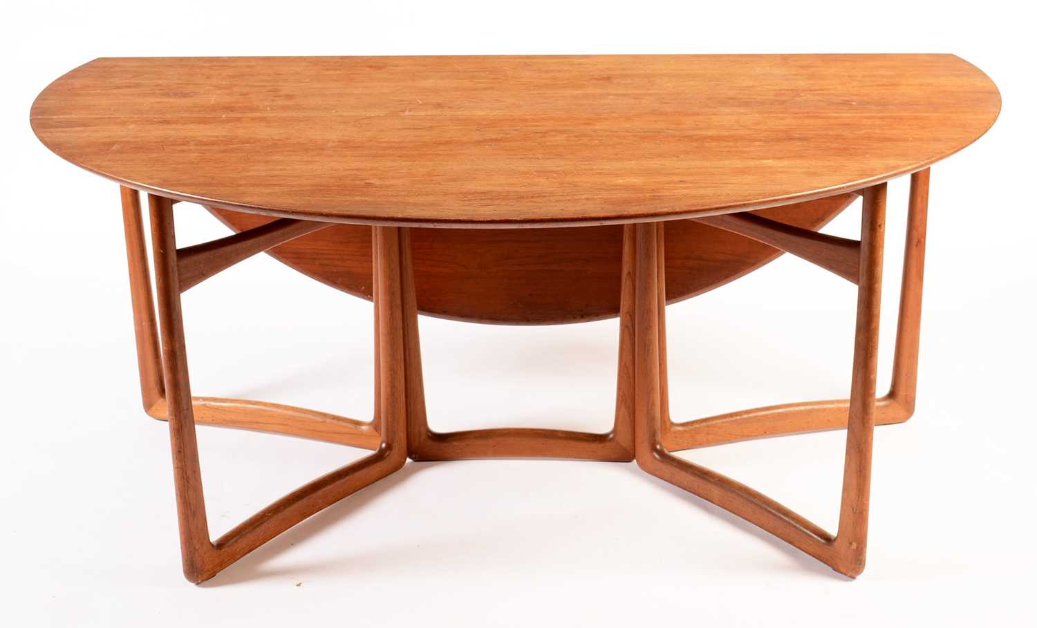 Lot 86 - Peter Hvidt & Orla Molgaard-Nielson for France & Son: a teak double gate-leg drop-leaf dining table