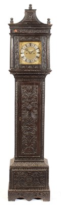 Lot 551 - Ion (Jon) Ellis of Sherbourne: an ebonised and carved oak longcase clock