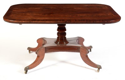 Lot 530 - An early 19th Century mahogany and banded tilt action dining table, probably Irish.