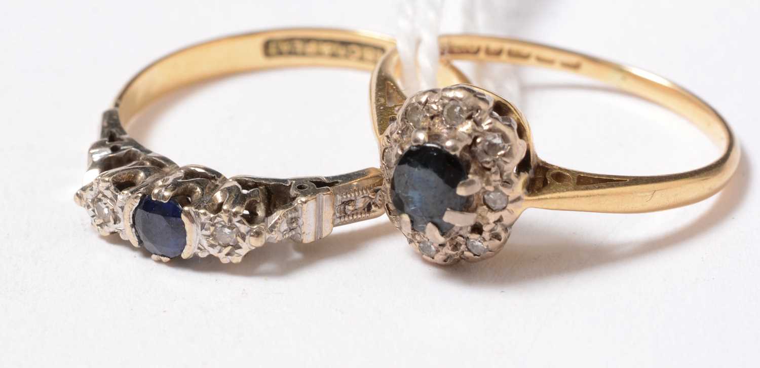 Lot 294 - Two early 20th century 18ct gold, diamond, and sapphire dress rings.