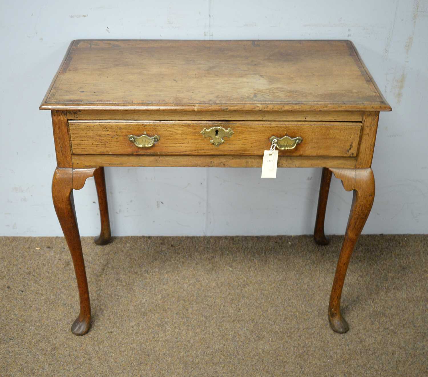 Lot 58 - An 18th C oak and mahogany banded side table.