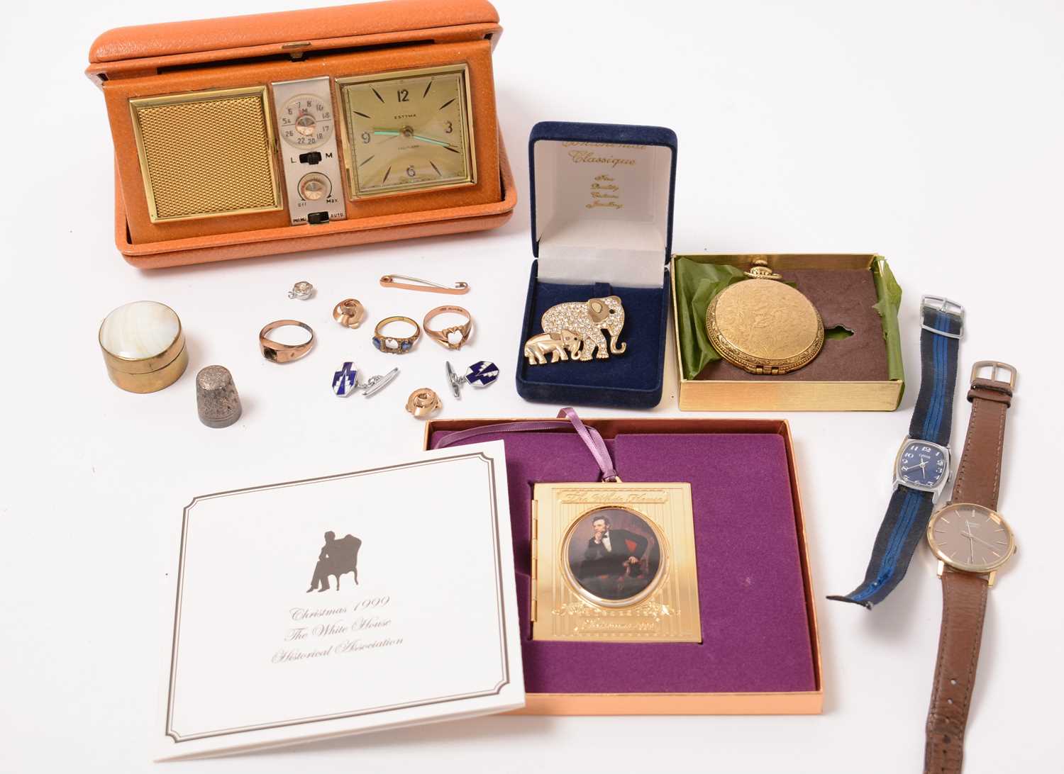 Lot 208 - Jewellery, watches, and a bedside alarm clock.