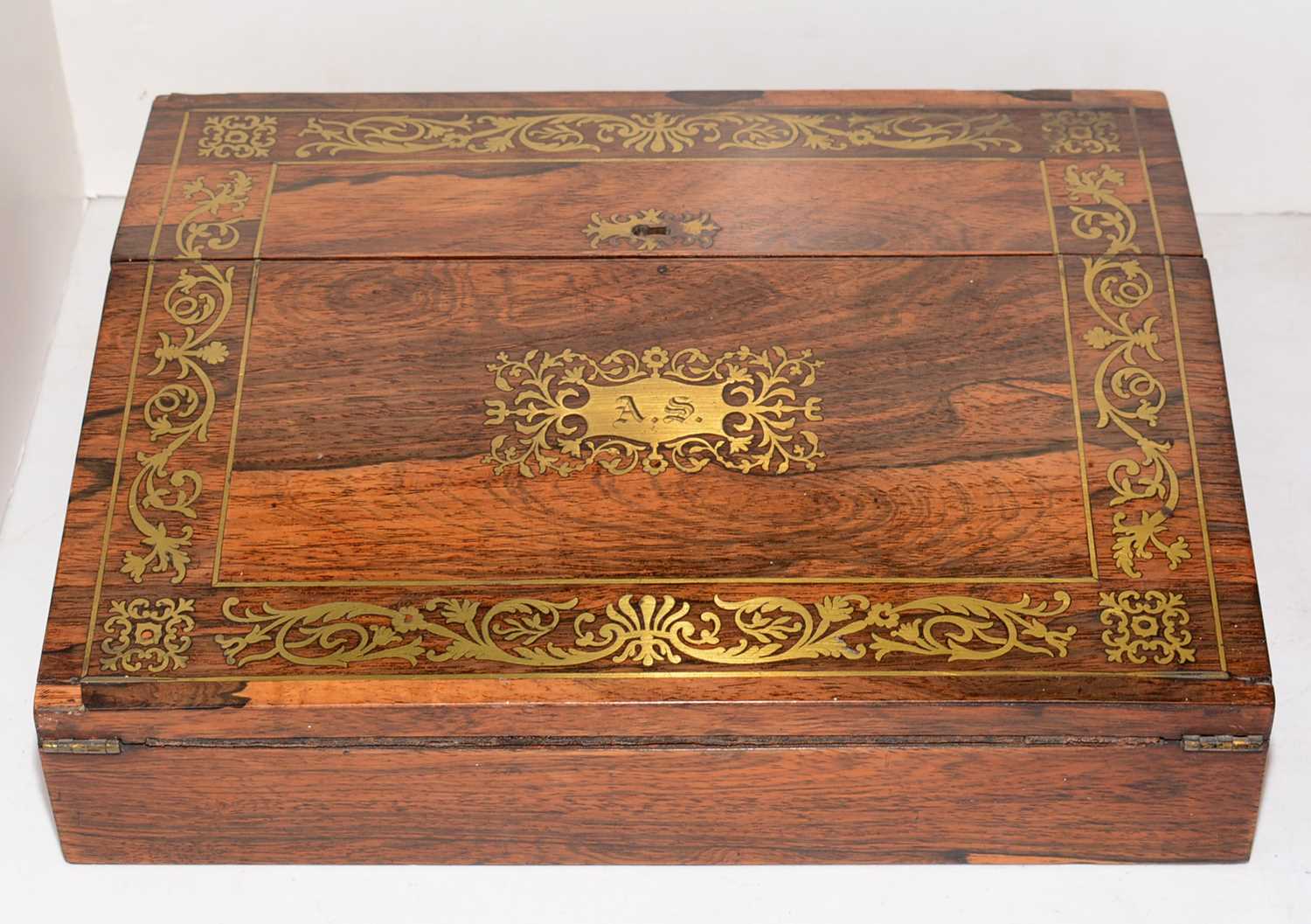 Lot 387 - A Victorian brass inlaid rosewood writing box