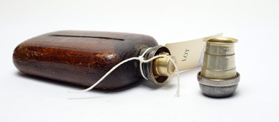 Lot 245 - An Edwardian silver mounted hip flask.