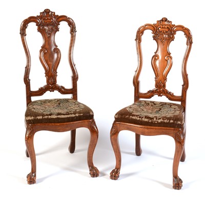 Lot 572 - Two carved walnut dining chairs