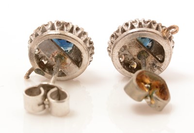 Lot 82 - A pair of sapphire and diamond cluster earrings