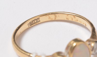 Lot 229 - A yellow-metal, opal, and diamond dress ring.