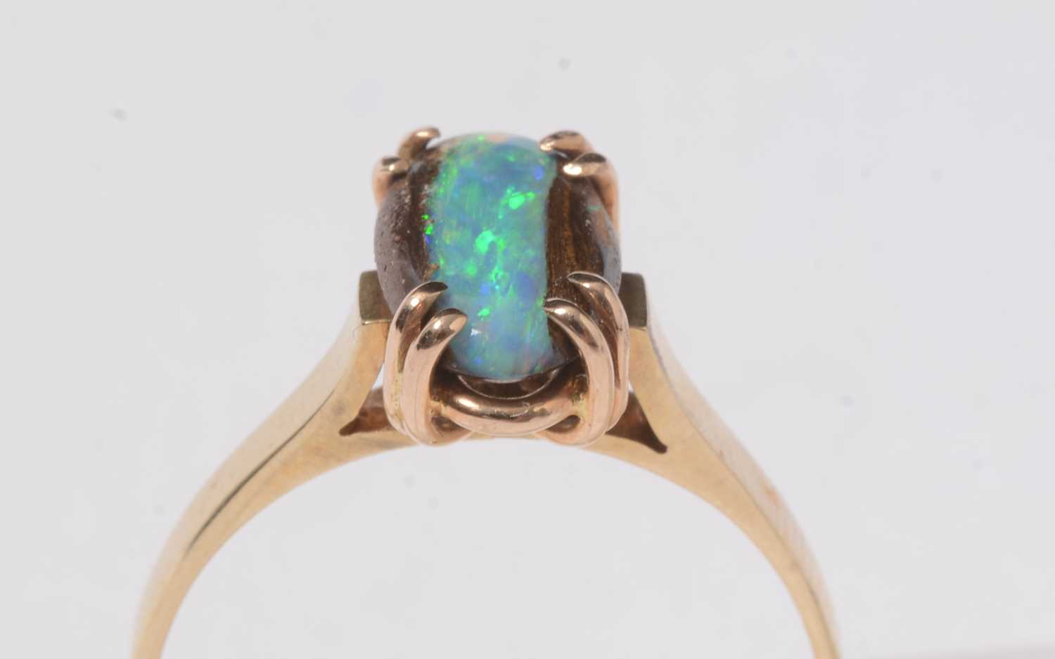 Lot 234 - A vintage black opal ore and yellow-metal dress ring.