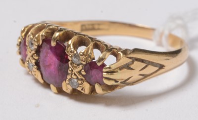 Lot 245 - An 18ct gold, diamond and ruby ring.