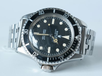 Lot 18 - A stainless steel Rolex Oyster Perpetual Date 'Red Writing' Submariner bracelet watch