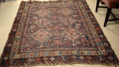 Lot 146 - A Caucasian carpet.