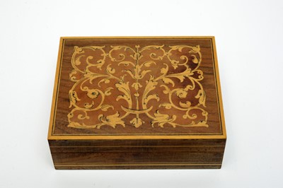 Lot 202 - A Capri wooden trinket box containing costume jewellery.