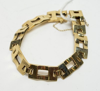 Lot 185 - A yellow-metal geometric link bracelet.