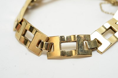 Lot 185 - A yellow-metal geometric link bracelet.