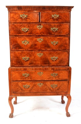 Lot 559 - A mid 18th Century walnut and banded chest-on-chest