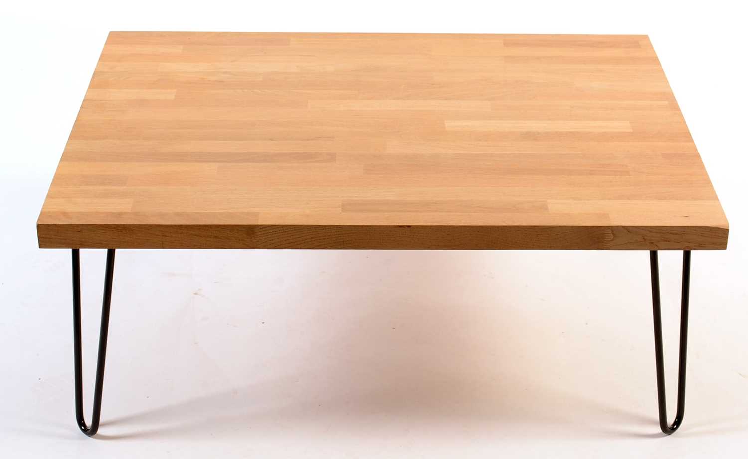 Lot 73 - Bieffe: a modern light oak coffee table.