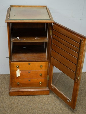 Lot 25 - Victorian oak glazed cabinet.