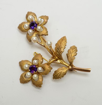 Lot 192 - An amethyst, cultured pearl and 9ct gold brooch.