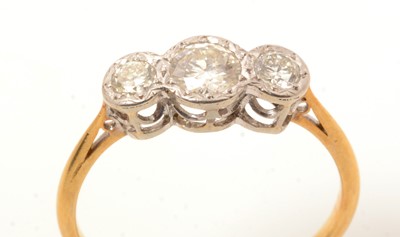 Lot 136 - A three stone diamond ring