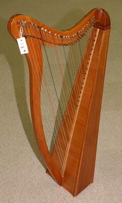 Lot 887 - A Celtic floor standing harp.