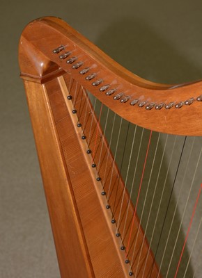 Lot 887 - A Celtic floor standing harp.