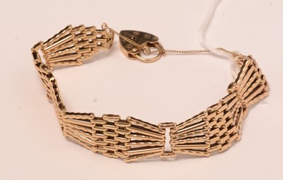Lot 120 - A 9ct gold gate-link bracelet.