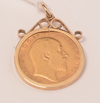 Lot 119 - An Edwardian gold half-sovereign in a pendant mount.