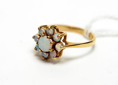 Lot 294 - An opal cluster ring