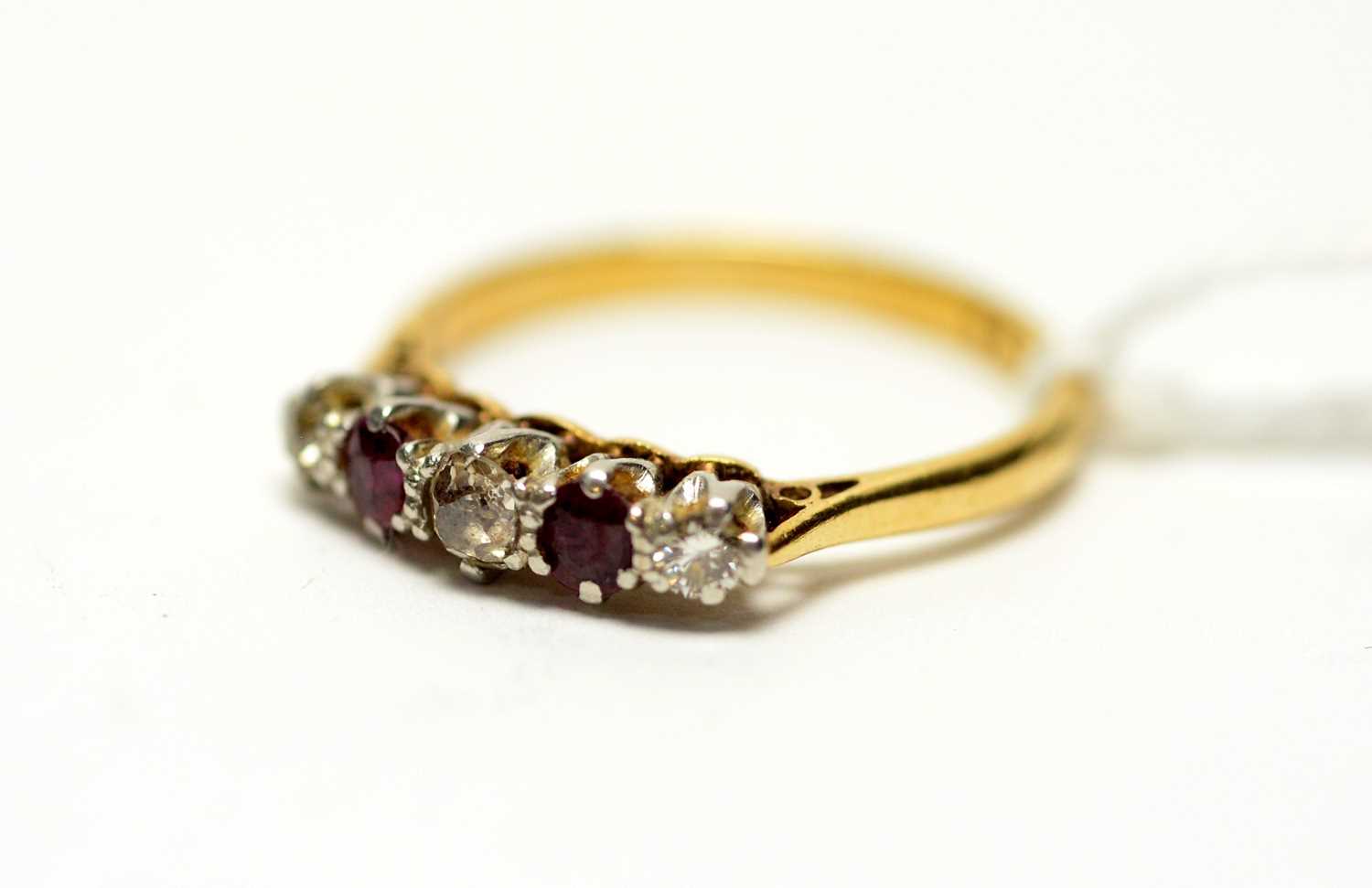 Lot 297 - A ruby and diamond ring