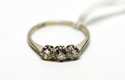 Lot 312 - A three stone diamond ring