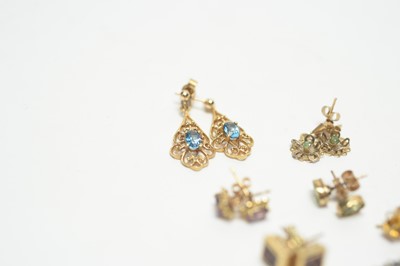 Lot 323 - A collection of gem set earrings