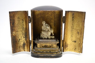Lot 324 - Marine Ivory Netsuke in lacquer case.