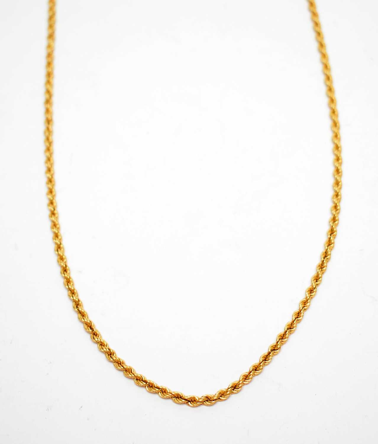 Lot 337 - A yellow metal twist link necklace chain