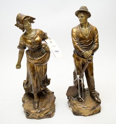 Lot 382 - A pair of early 20th Century gilt decorated figures