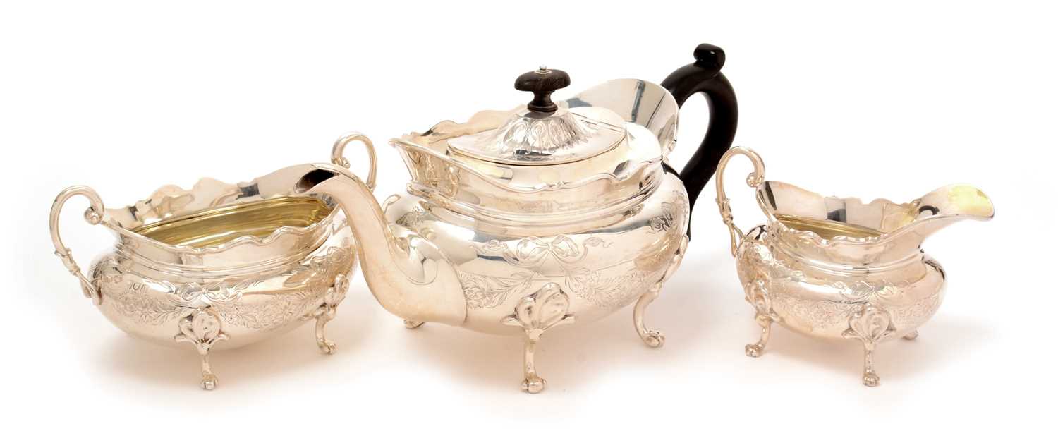 Lot 161 - A George V silver three piece tea service