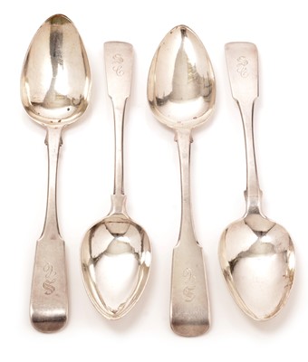 Lot 158 - A set of four George III silver table spoons
