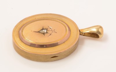 Lot 44 - A Victorian yellow metal diamond set locket pendant