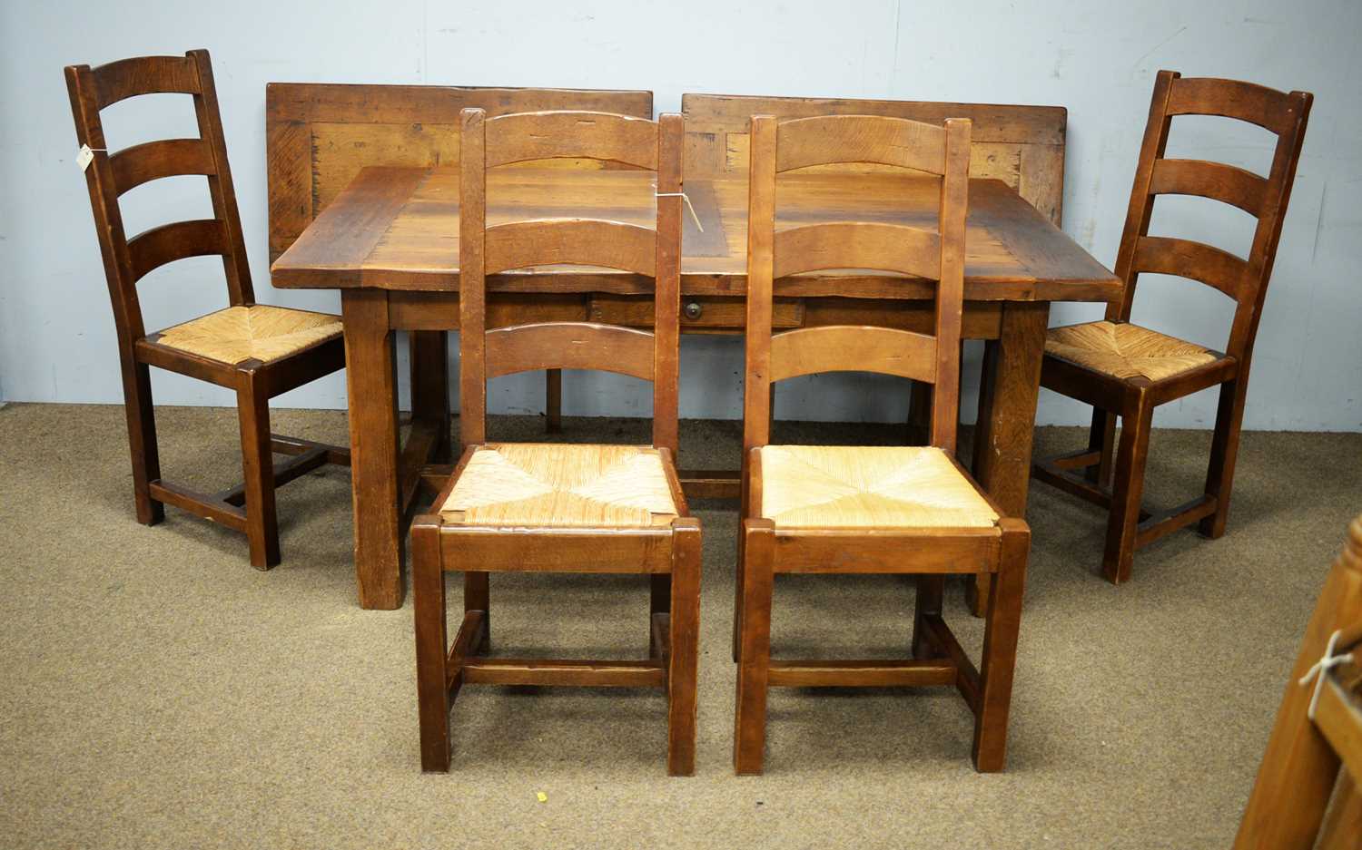 Lot 25 - 20th Century oak Wesley Barrell refectory table and four chairs