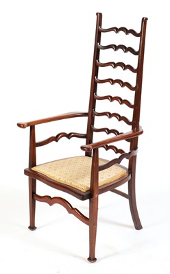Lot 563 - An  Arts & Crafts walnut occasional ladder back armchair