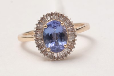 Lot 91 - A contemporary tanzanite and diamond dress ring.