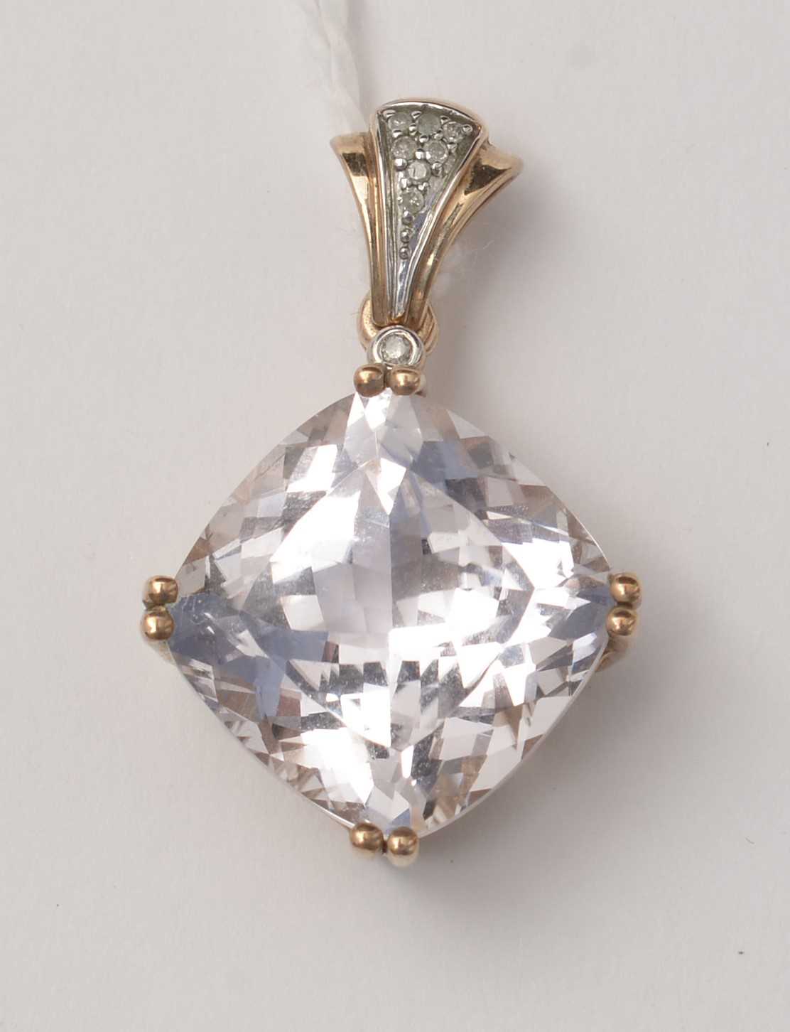 Lot 88 - A contemporary kunzite and diamond pendant.