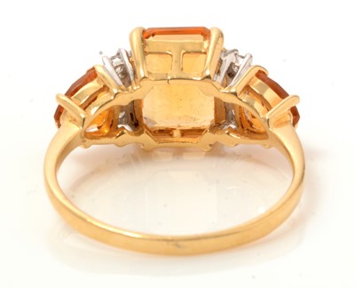 Lot 100 - A citrine and diamond ring