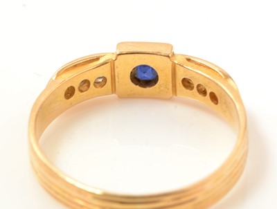 Lot 240 - A sapphire and diamond ring