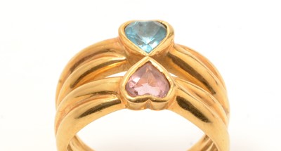 Lot 106 - A tourmaline and topaz ring