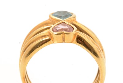 Lot 106 - A tourmaline and topaz ring