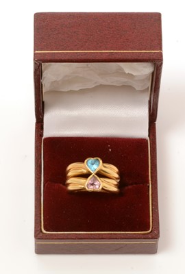 Lot 242 - A tourmaline and topaz ring