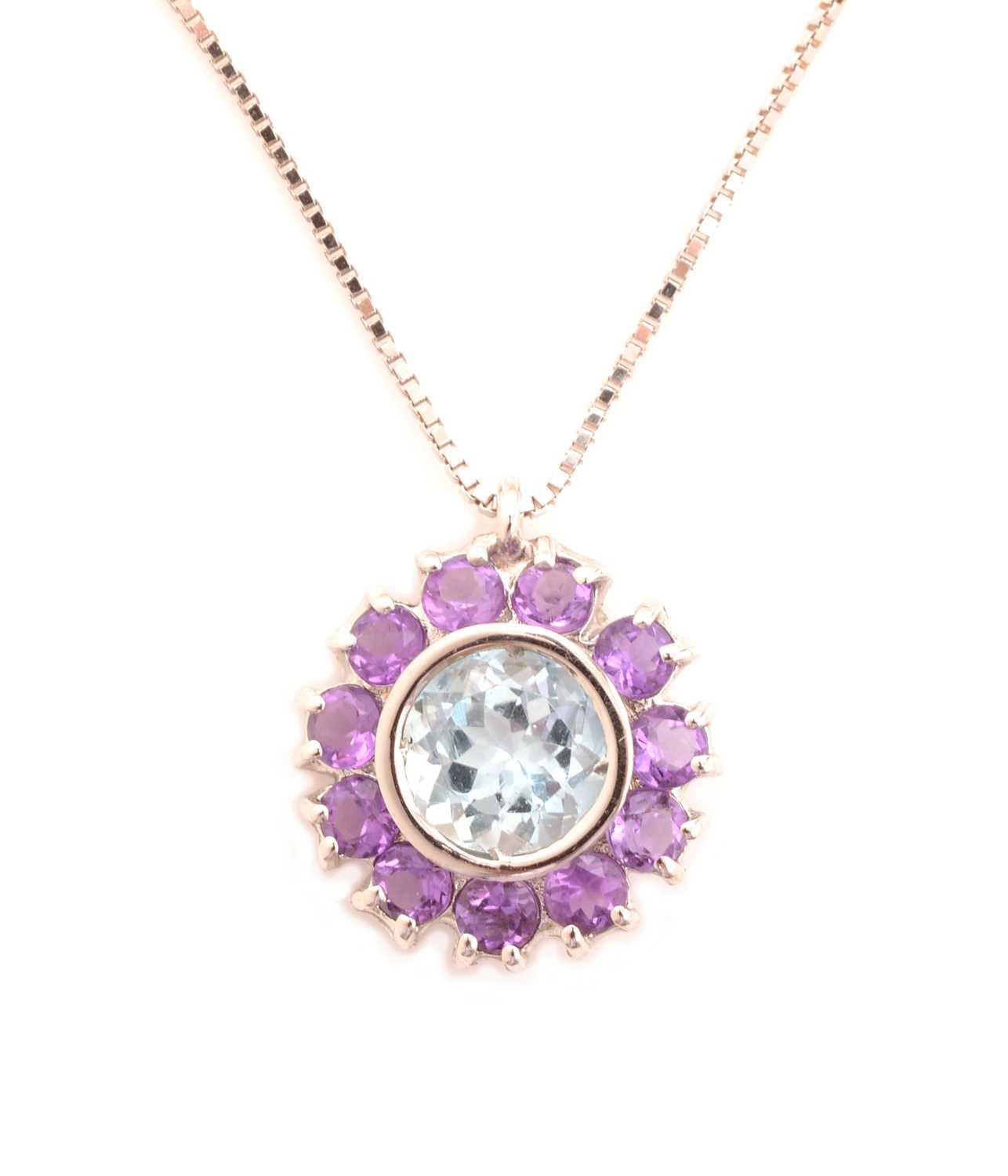 Lot 108 - An aquamarine and amethyst cluster pendant, by Pascal