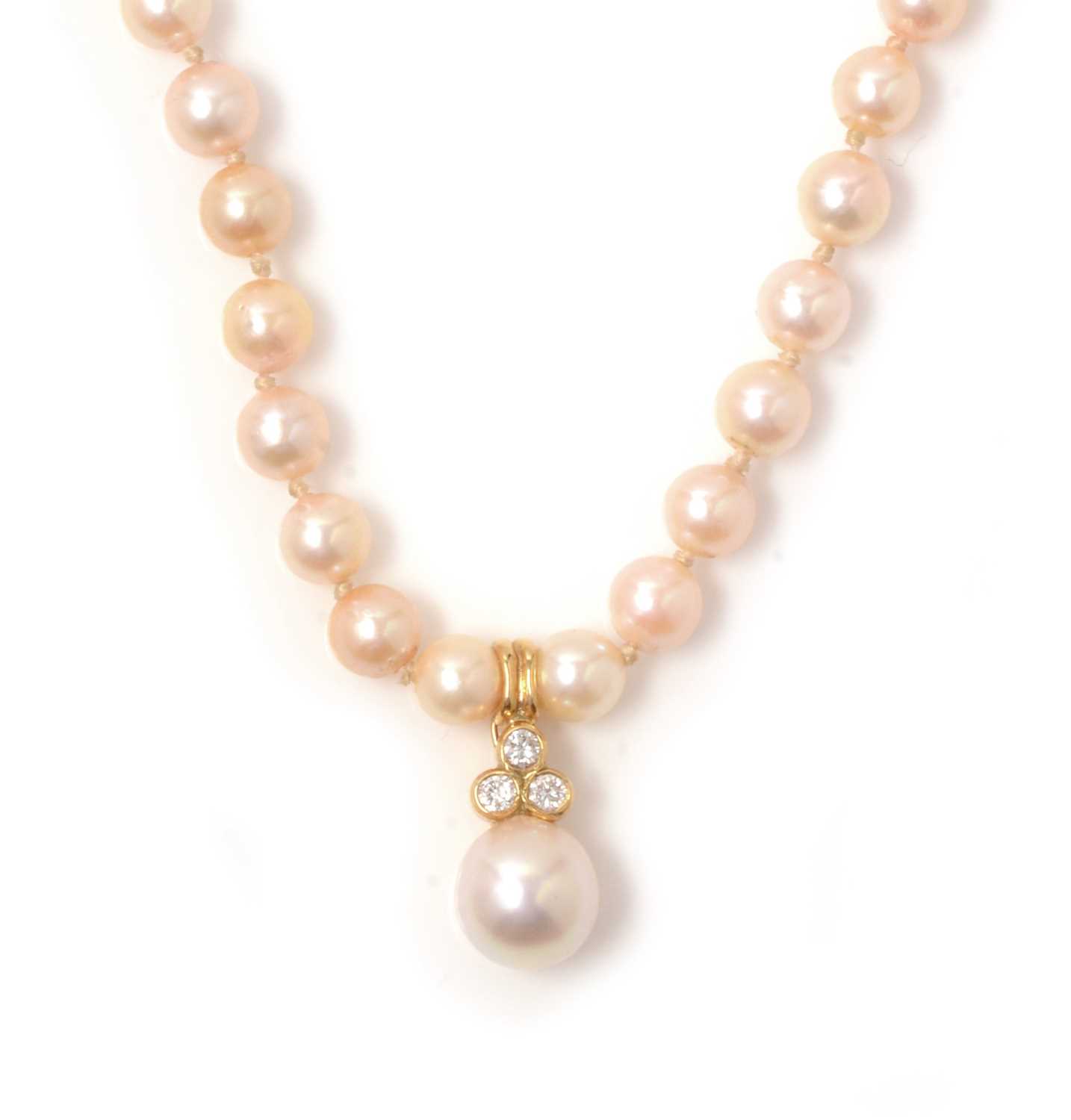 Lot 113 - A diamond and cultured pearl pendant and necklace